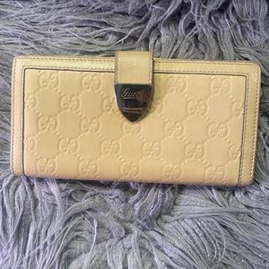 Gucci Pale Yellow GG Embossed Leather Continental Wallet with Metal Logo Tab